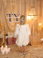 فستان مواليد بيج بتفاصيل دانتيل