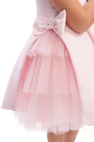 فستان مواليد بكشكشه تل بجانب واحد مع ربطة شعر