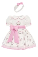 فستان مواليد مع ربطه شعر