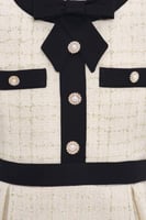 فستان شانيل تويد مع شنطة انيقة