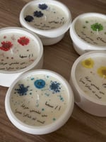 شمعة الورد الطبيعي مع العباره