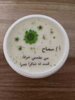 شمعة الورد الطبيعي مع العباره