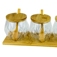 طقم برطمانات زجاجية مع ملاعق وأغطية خشبية