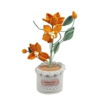 زهرة كروشيه في أصيص يدوي