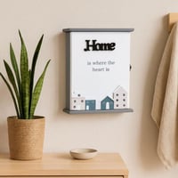 صندوق مفاتيح جداري بتصميم منازل