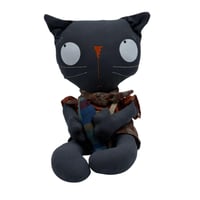 دمية قماش قط بملابس فلكلورية