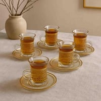 طقم بيالات شاي زجاجية مزخرفة مع صحون تقديم – عدد 6...