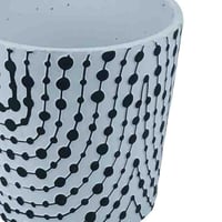 أصيص زراعة سيراميكي مزخرف بنمط نقاط متعرجة