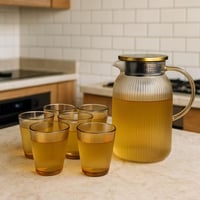 طقم إبريق وكاسات زجاجية مخططة