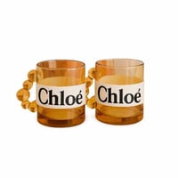 طقم كوبين زجاج بلون كهرماني بمقبض زجاجي انيق