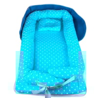 سرير أطفال بشكل حقيبة 2 في 1