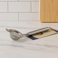 مصفاة ستانلس ستيل ناعمة بمقبض معدني