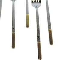 طقم شوك طعام استيل بمقبض مزخرف ذهبي