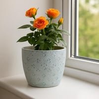 أصيص سيراميك مزخرف بنقوش هندسية بارزة