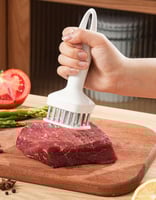 مطرقة تطرية اللحم بـ 24 إبرة ستيل – تصميم مربع وقا...