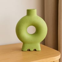 مزهرية ديكور خزفية دائرية بتصميم عصري