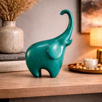 تمثال فيل ديكوري عصري باللون الفيروزي