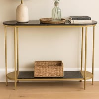 طاولة كونسول بإطار ذهبي وسطح رخامي أسود
