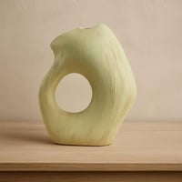 مزهرية ديكور سيراميكية بتصميم عضوي منحني