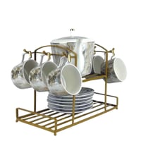 طقم شاي بورسلان بنقشة رخامية مع حامل ذهبي