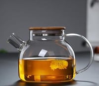 إبريق شاي زجاجي مع غطاء بامبو