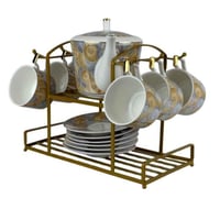 طقم شاي بورسلان فاخر بنقشة دائرية مع حامل معدني ذه...