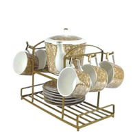 طقم شاي فاخر من البورسلان مع حامل معدني ذهبي