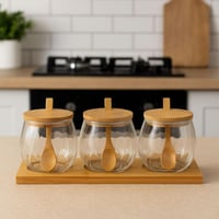 طقم برطمانات زجاجية مع ملاعق وأغطية خشبية