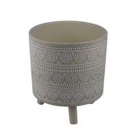 أصيص سيراميك مزخرف مع قاعدة خشبية