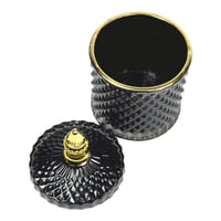 علبة تخزين زجاجية فاخرة بنقوش بارزة وغطاء ذهبي