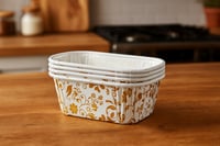 علب ورقية مستطيلة بنقشة ذهبية