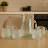 طقم إبريق زجاجي مع 4 أكواب شفافة بتصميم مخطط