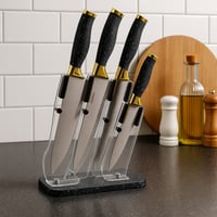 طقم سكاكين مطبخ فاخر بمقابض سوداء مزخرفة ولمسات ذه...