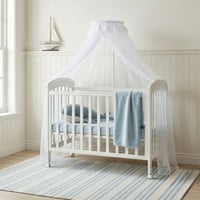 سرير أطفال خشبي بناموسية مع تخزين عملي أبيض