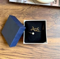 اساور الاحرف بشكل جديد