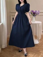 ‏فستان طويل بأكمام منفوخة