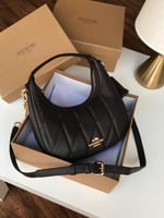 شنطة كوتش لمسة فخامة