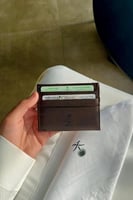 محفظة ملكية بشعار سيفين ونخلة