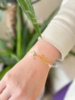 اسوارة بالاسم مع وردة الزركون