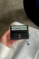 محفظة ملكية بشعار سيفين ونخلة