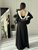 فستان اسود ناعم بلمسات باللون الابيض