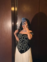 فستان سهرة راقي طويل بكورسيه مطرز باللون الأبيض وا...