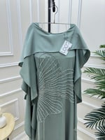 جلابية باللون التيفاني مع تطريز