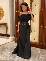 فستان اسود بتفاصيل انيقة