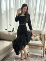 فستان اسود بقصة مائلة