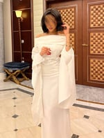 فستان ابيض انيق بتصميم ناعم