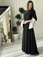 فستان اسود ناعم بلمسات باللون الابيض