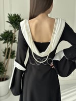 فستان اسود ناعم بلمسات باللون الابيض