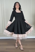 فستان ناعم بلمسات من الدانتيل والتل