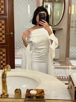 فستان ابيض انيق بتصميم ناعم